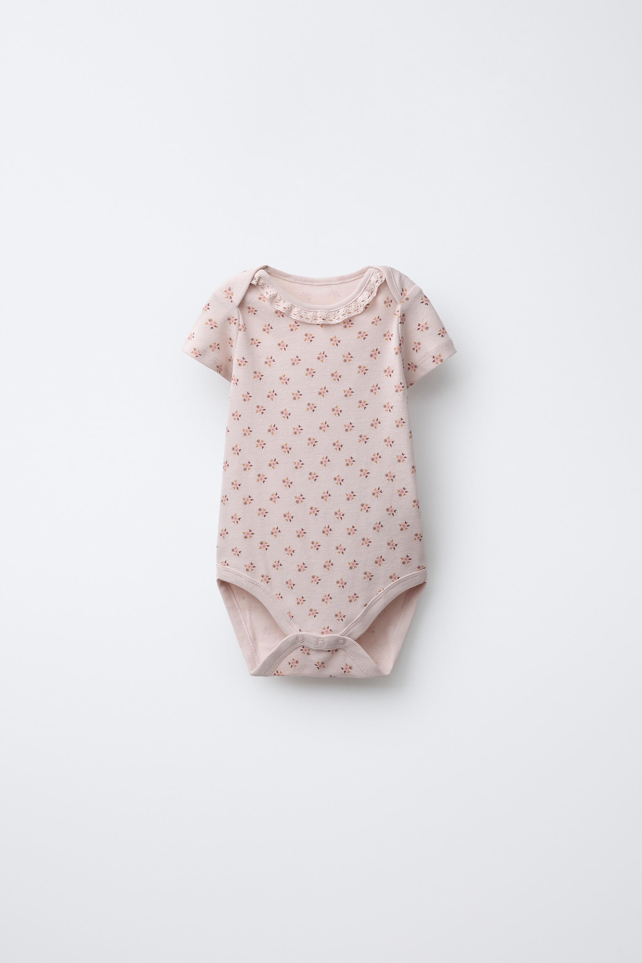 FIVE-PACK OF FLORAL BODYSUITS